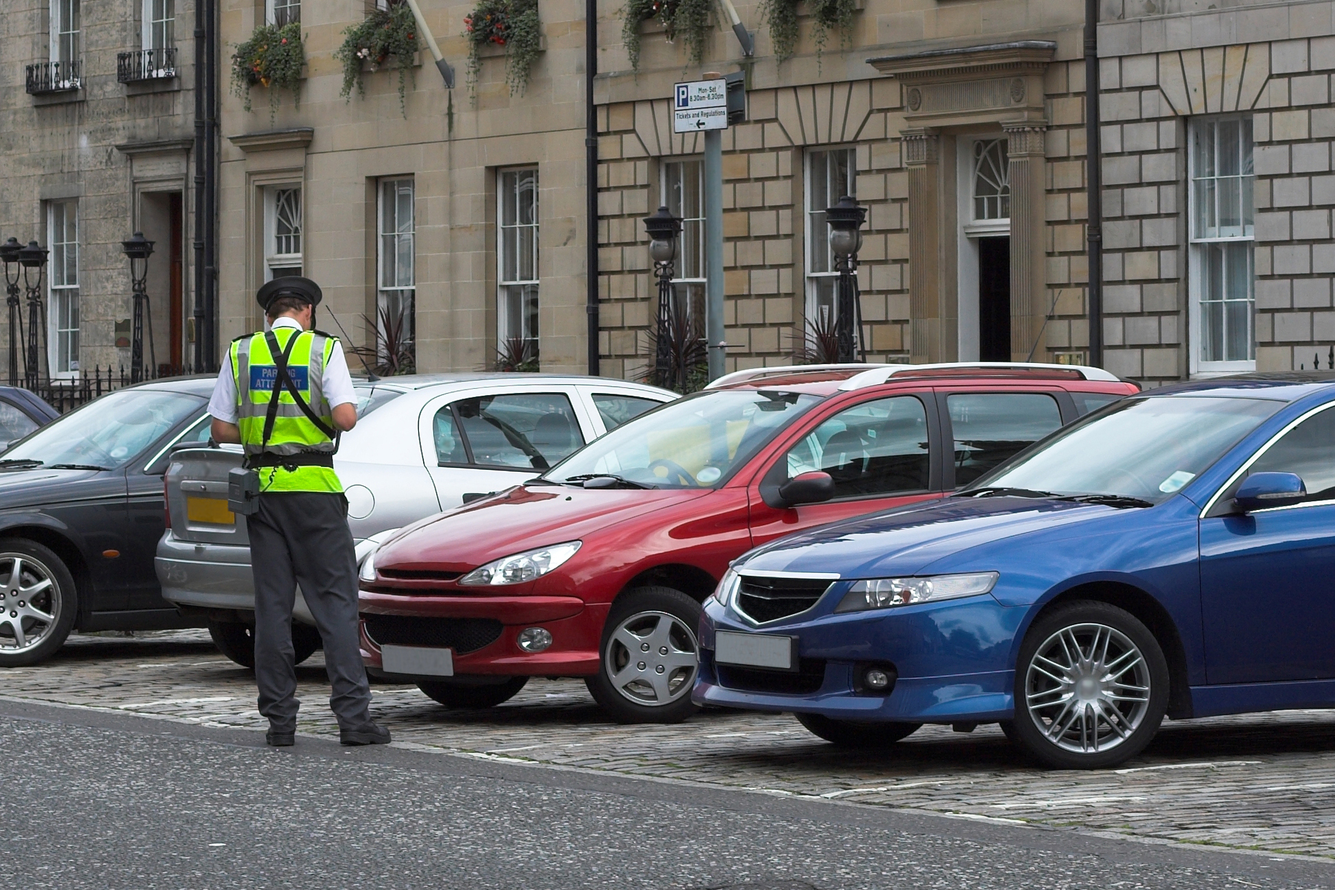 parking attendant, traffic warden, getting ticket fine mandate